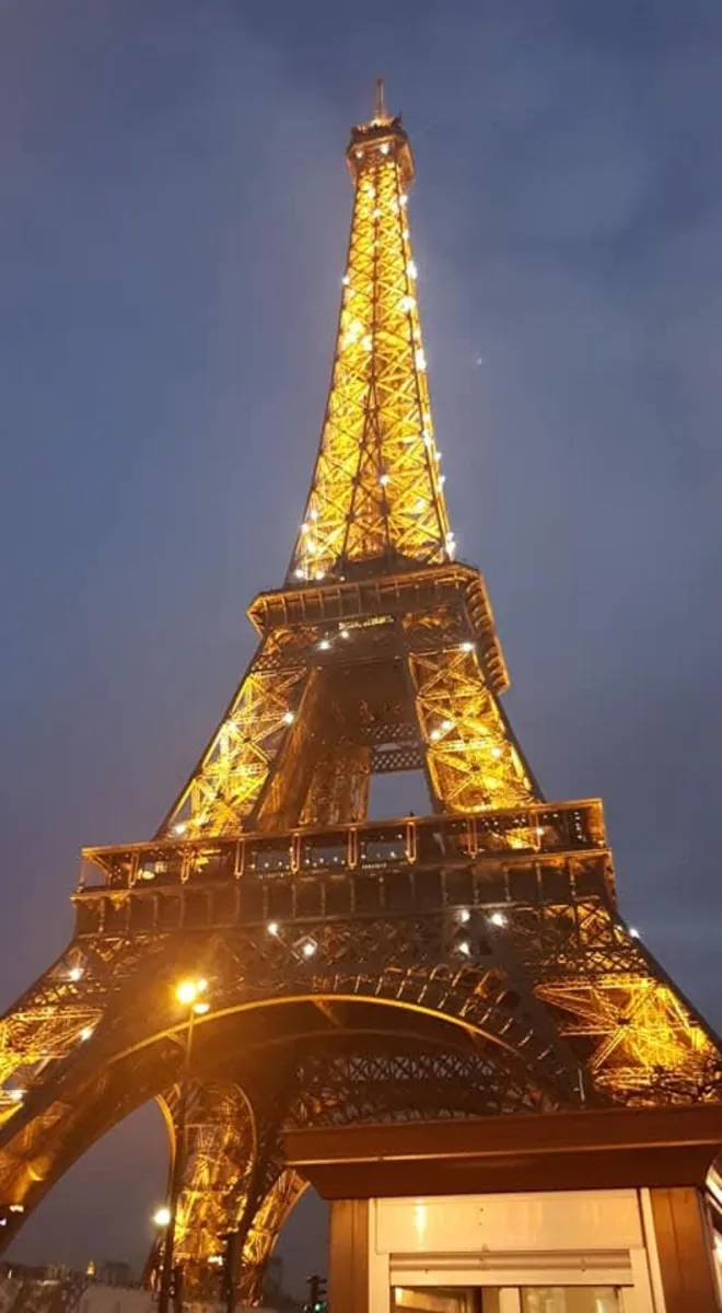 The Eiffel Tower illuminated at night during our Paris visit