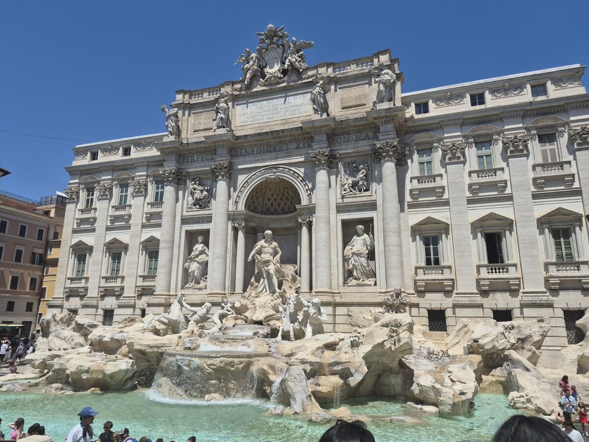 The Trevi Fountain in July sunshine